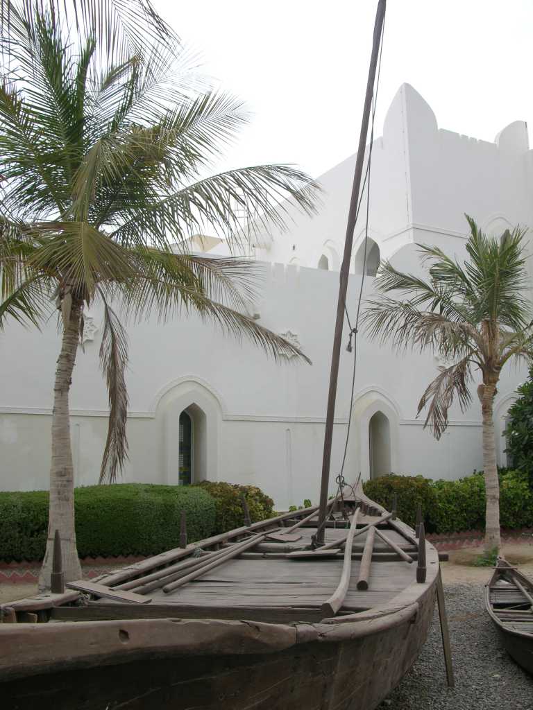 Muscat 02 Muscat 04 Bait al Zubair Outside Fishing Boat Outside the Bait al Zubair museum are re-creations of a traditional Omani mountain village, irrigation systems, buildings made from palm fronds and a variety of fishing boats used in Oman.